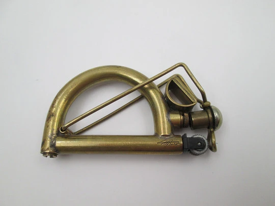 Ritter wick petrol pocket lighter. Gold plated metal. Harp shape. Germany. 1970's Ritter wick petrol pocket lighter. Gold plated metal. Harp shape. Germany. 1970's