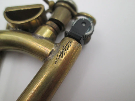 Ritter wick petrol pocket lighter. Gold plated metal. Harp shape. Germany. 1970's Ritter wick petrol pocket lighter. Gold plated metal. Harp shape. Germany. 1970's