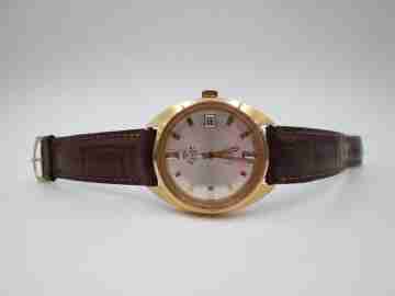 River Geneve. Acero y chapado oro. Automático. Segundero. Calendario. 1970