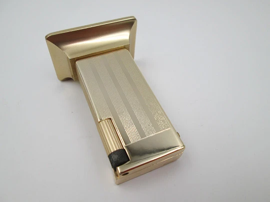 Rivo table petrol lighter / mechanical clock. Gold plated metal. 1960's. Swiss