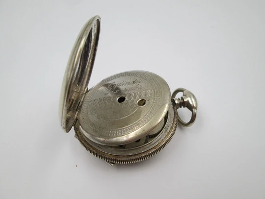 Robin Geneve pocket watch. Gold plated metal. Ornate back. Key-wind movement. 1890's