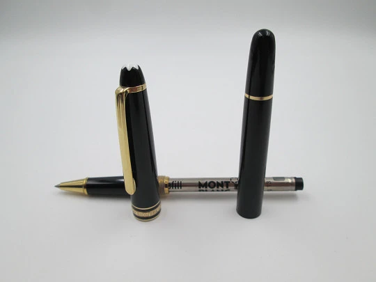 Rollerball Montblanc Meisterstück 144. Resina negra y chapados oro. Estuche