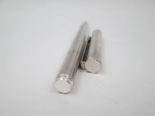 Rollerball pen. 925 sterling silver. Rhomboidal guilloche & vertical stripes. 1980's. Europe