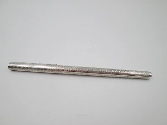 Rollerball pen. 925 sterling silver. Rhomboidal guilloche & vertical stripes. 1980's. Europe