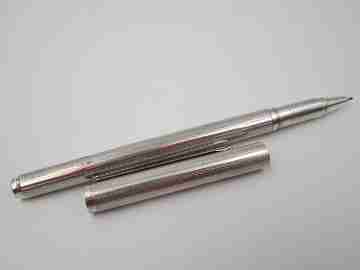 Rollerball pen. 925 sterling silver. Rhomboidal guilloche & vertical stripes. 1980's. Europe