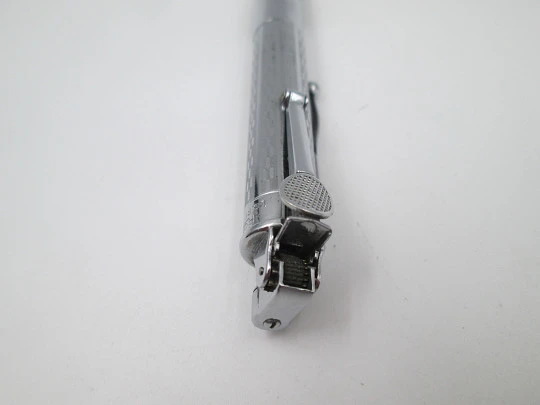Ronson Penciliter petrol lighter with propelling pencil. Chromed metal and plastic. 1940's Ronson Penciliter petrol lighter with propelling pencil. Chromed metal and plastic. 1940's