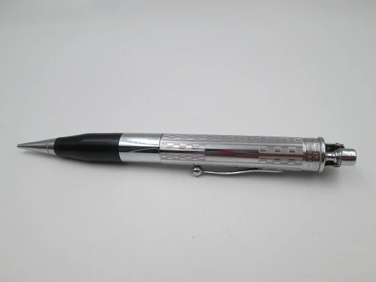Ronson Penciliter petrol lighter with propelling pencil. Chromed metal and plastic. 1940's Ronson Penciliter petrol lighter with propelling pencil. Chromed metal and plastic. 1940's
