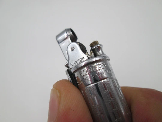 Ronson Penciliter petrol lighter with propelling pencil. Chromed metal and plastic. 1940's Ronson Penciliter petrol lighter with propelling pencil. Chromed metal and plastic. 1940's