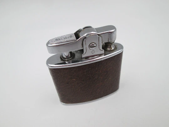 Ronson Standard pocket petrol lighter. Chromed metal & leather. 1940's. England