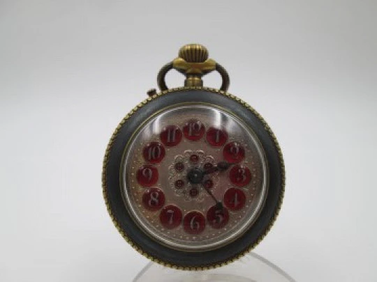 Roskopf System. Iron and gold plated. 1900. Swiss. Silver and red enamel dial