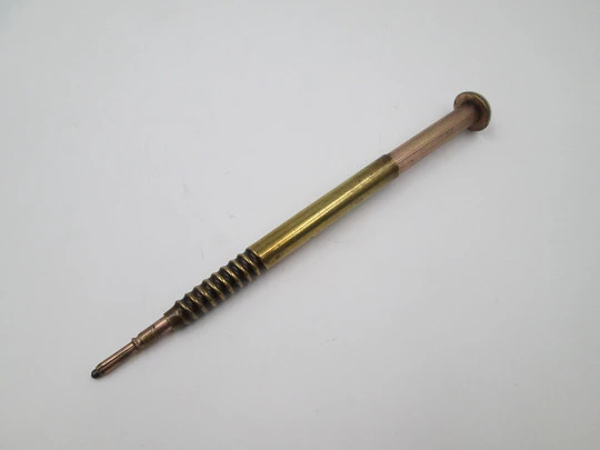 Rotating telescopic mechanical pencil. Gold plated metal. Screw shape. 1910