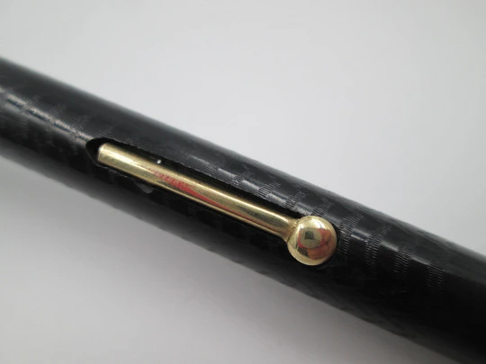 Royal. Black hard rubber and bitone metal. 14 karat gold nib. Lever filler. USA. 1920's