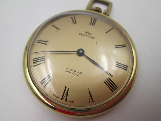 Royce. Gold plated case (Silvan Kocher). Manual wind. Press back. Golden dial. 1960's