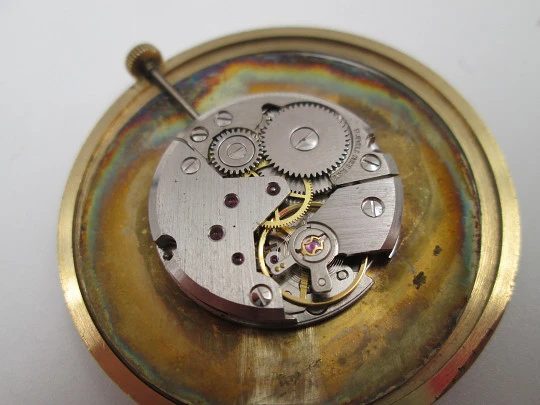 Royce. Gold plated case (Silvan Kocher). Manual wind. Press back. Golden dial. 1960's
