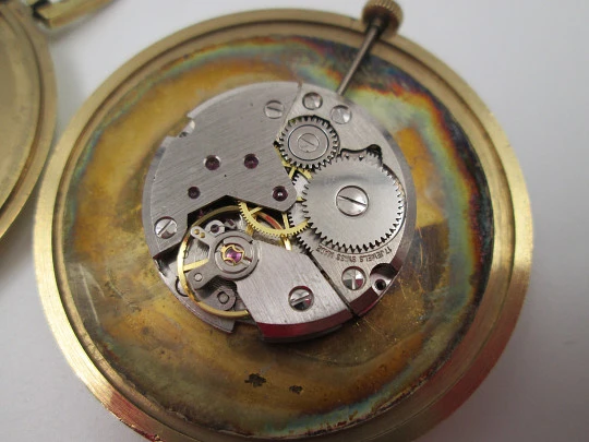 Royce. Gold plated case (Silvan Kocher). Manual wind. Press back. Golden dial. 1960's