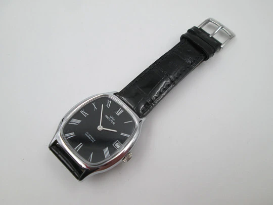 Royce. Stainless steel. Manual wind. Calendar. Black dial. Strap. 1970's. Swiss