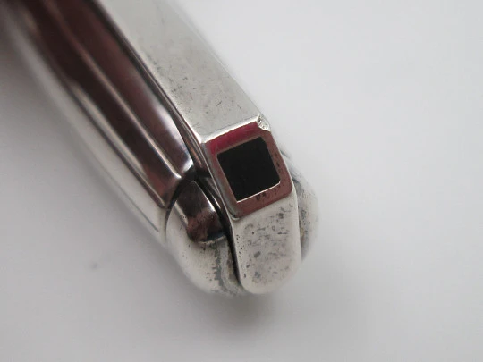 S. T. Dupont ballpoint pen. Black resin and platinum plated. Twist system. 1990's. France