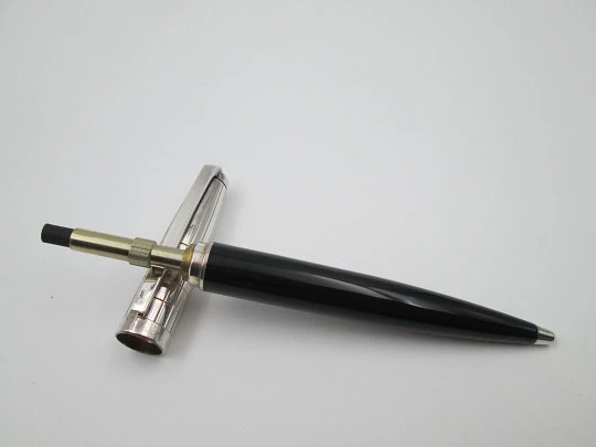 S. T. Dupont ballpoint pen. Black resin and platinum plated. Twist system. 1990's. France