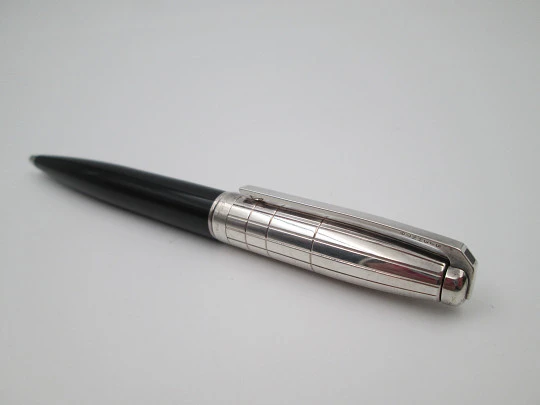 S. T. Dupont ballpoint pen. Black resin and platinum plated. Twist system. 1990's. France