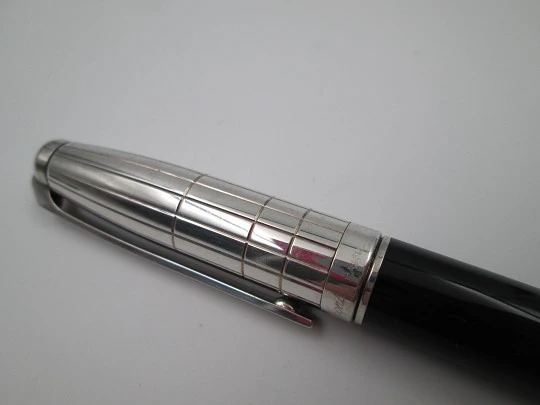 S. T. Dupont ballpoint pen. Black resin and platinum plated. Twist system. 1990's. France