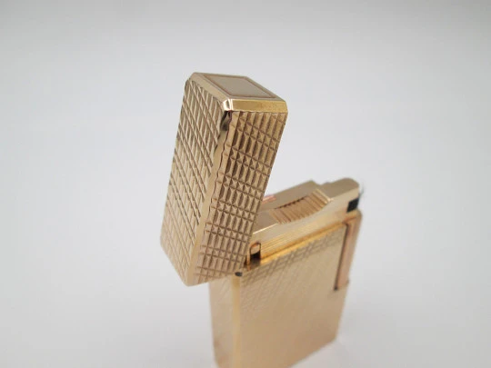 S. T. Dupont Paris lighter. Gold plated. Geometric pattern. France. 1990's