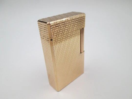 S. T. Dupont Paris lighter. Gold plated. Geometric pattern. France. 1990's