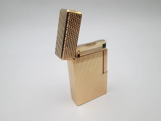 S. T. Dupont Paris lighter. Gold plated. Geometric pattern. France. 1990's