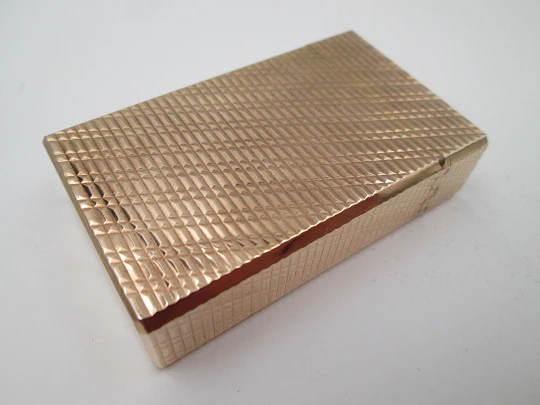 S. T. Dupont Paris lighter. Gold plated. Geometric pattern. France. 1990's