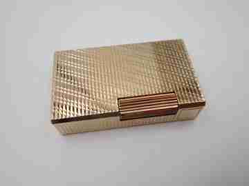 S. T. Dupont Paris lighter. Gold plated. Geometric pattern. France. 1990's