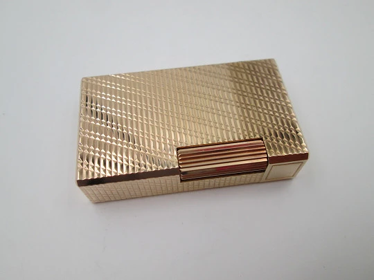 S. T. Dupont Paris lighter. Gold plated. Geometric pattern. France. 1990's