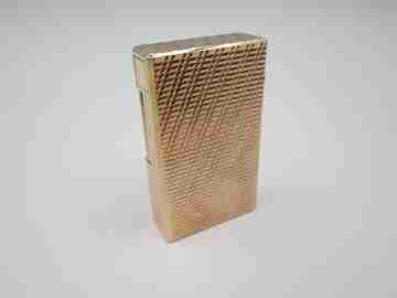 S. T. Dupont Paris lighter. Gold plated. Geometric pattern. France. 1990's