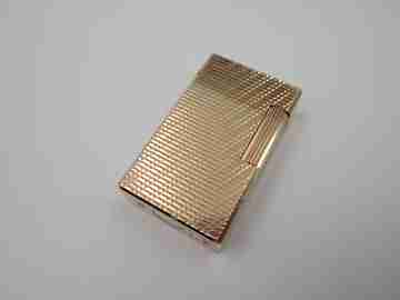 S. T. Dupont Paris lighter. Gold plated. Geometric pattern. France. 1990's
