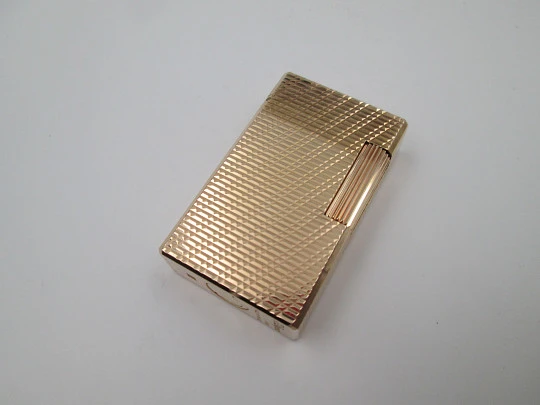 S. T. Dupont Paris lighter. Gold plated. Geometric pattern. France. 1990's