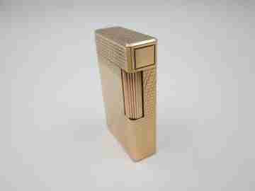 S. T. Dupont Paris lighter. Gold plated. Geometric pattern. France. 1990's