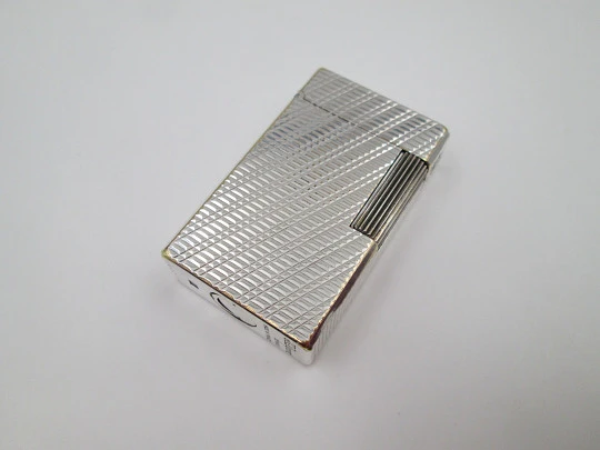 S. T. Dupont Paris lighter. Silver plated. Diagonal pattern. France. 1990's