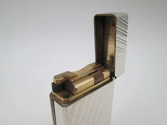 S. T. Dupont Paris lighter. Silver plated. Diagonal pattern. France. 1990's