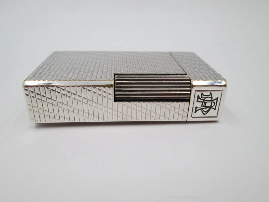 S. T. Dupont Paris lighter. Silver plated. Diagonal pattern. France. 1990's