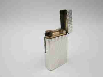 S. T. Dupont Paris lighter. Silver plated. Diagonal pattern. France. 1990's