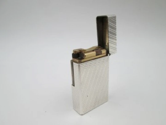 S. T. Dupont Paris lighter. Silver plated. Diagonal pattern. France. 1990's