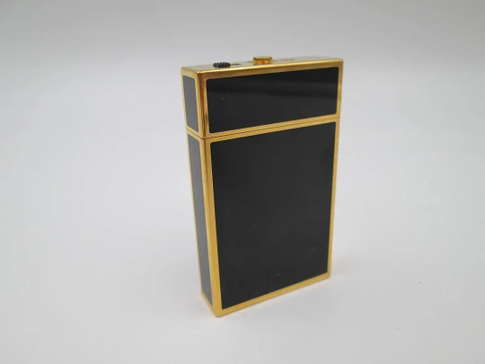 S. T. Dupont Paris travel clock with alarm. Chinese lacquer and gold plated. Quartz. 1980's S. T. Dupont Paris travel clock with alarm. Chinese lacquer and gold plated. Quartz. 1980's