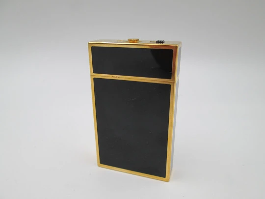 S. T. Dupont Paris travel clock with alarm. Chinese lacquer and gold plated. Quartz. 1980's S. T. Dupont Paris travel clock with alarm. Chinese lacquer and gold plated. Quartz. 1980's