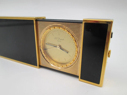S. T. Dupont Paris travel clock with alarm. Chinese lacquer and gold plated. Quartz. 1980's S. T. Dupont Paris travel clock with alarm. Chinese lacquer and gold plated. Quartz. 1980's