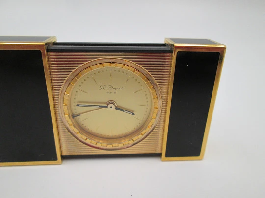 S. T. Dupont Paris travel clock with alarm. Chinese lacquer and gold plated. Quartz. 1980's S. T. Dupont Paris travel clock with alarm. Chinese lacquer and gold plated. Quartz. 1980's