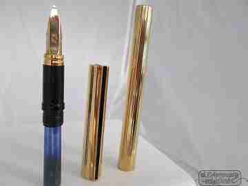 S. T. Dupont. Metal chapado oro. Clip laca negra. 2000. Oro 18K. Caja