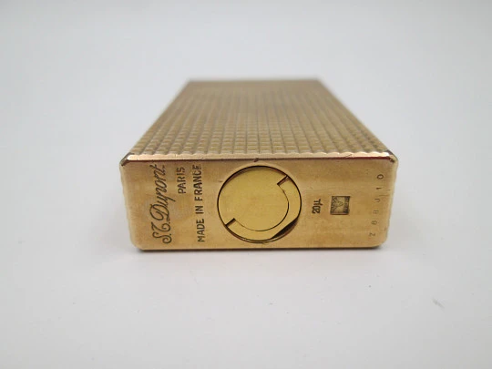 S.T. Dupont gas lighter. 20 microns gold plated. Diamond pattern. Box. France. 1990's