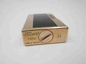 S.T. Dupont gas lighter. Black chinese lacquer & gold plated. 1980's. Original box. France