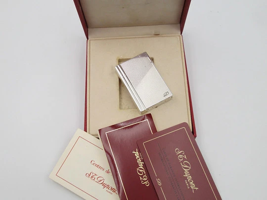 S.T. Dupont lighter. Rolled silver plated. Lines pattern. Original box. 2002's