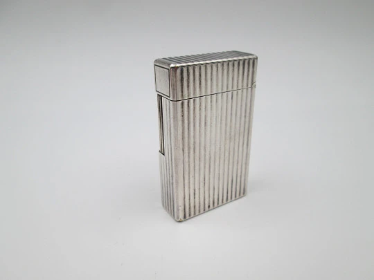 S.T. Dupont lighter. Silver plated metal. Lines pattern. Original box. 1990's