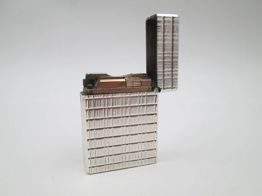 S.T. Dupont Paris gas lighter. Sterling silver rolled. Lines pattern. Box. France