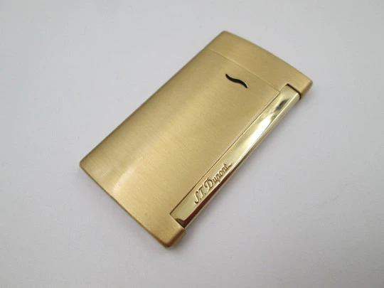 S.T. Dupont Paris Slim 7 torch flame gas lighter. Gold plated metal. France. 2020's S.T. Dupont Paris Slim 7 torch flame gas lighter. Gold plated metal. France. 2020's